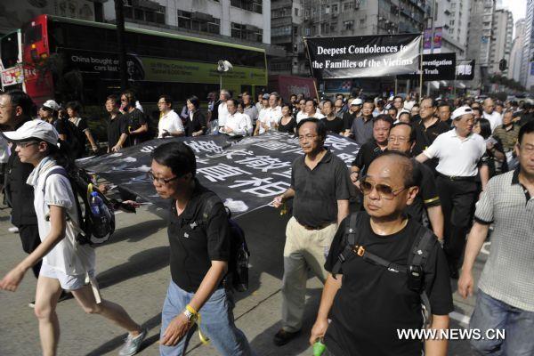 HK stages massive rally to mourn for hostage victims, demand apology and probe