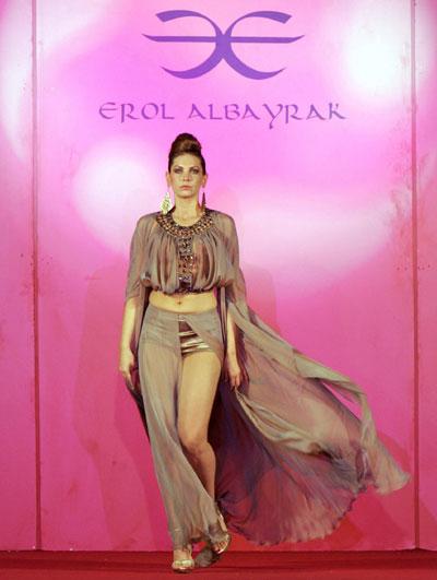 Models present creations by Albayrak at a trade fair in Arbil