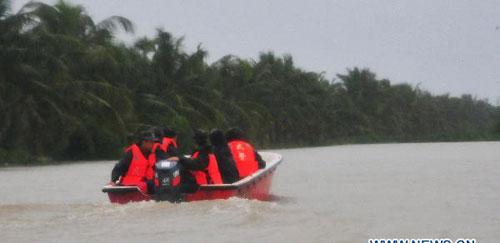 Trapped people in flooded Hainan transfered to safe areas