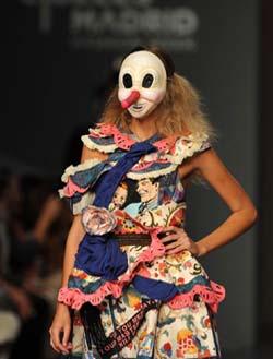 Models present creation by designer during Madrid Fashion Week