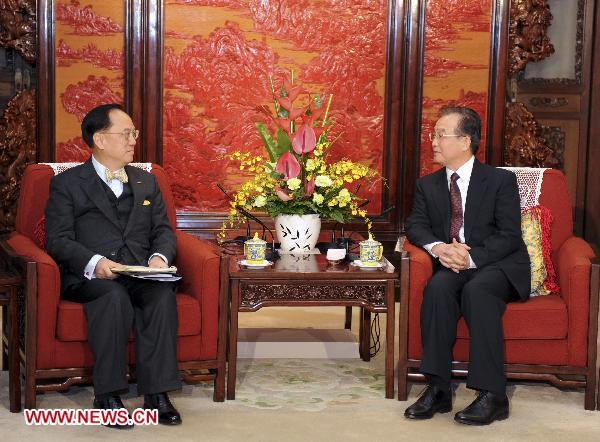 Chinese Premier vows to improve cooperation between Hong Kong, Macao, mainland