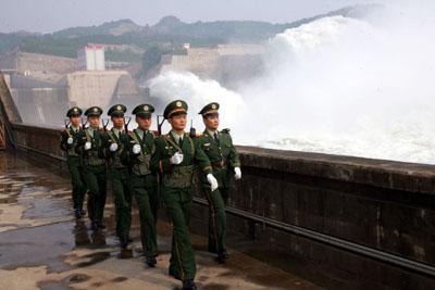 Armed police take guard at Xiaolangdi Dam