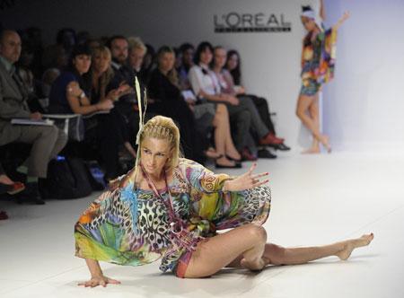 Models display outfits at fashion show in Burgos