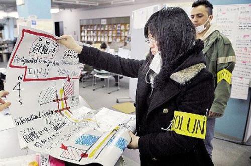 Chinese Student Continues to Serve in Japan's Quake-hit Area
