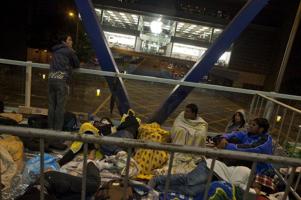 Queues out in HK for latest iPhone