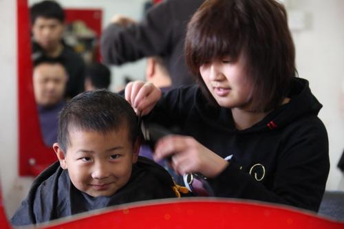 Get a lucky haircut on Er Yue Er for good luck