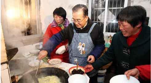 Chinese Premier Visits Farmers, Workers to Extend Spring Festival Greetings
