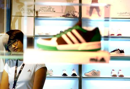 Struggling Adidas sees long-term growth ahead
