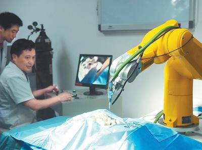 World   s First Minimally Invasive Spine Surgery Robot Put into Trial in China
