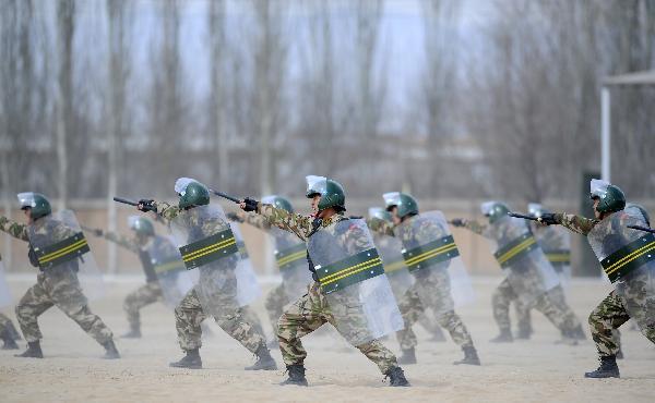 Armed policemen take part in drill in NW China's Yinchuan