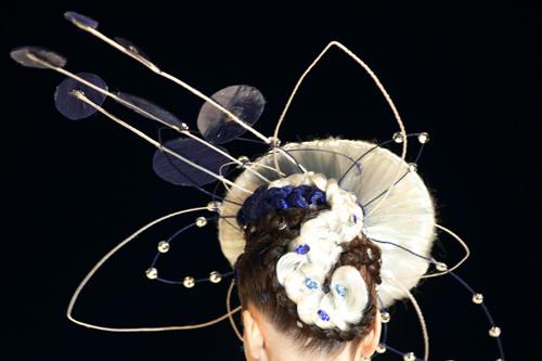 Models display hairstyles during Crystal Angel Festival