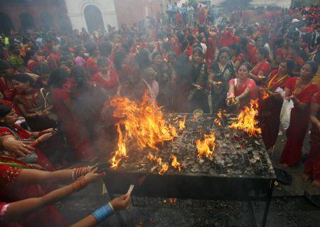 Hindu women celebrate Teej festival in red, Nepal