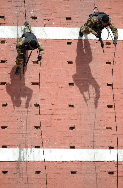 Armed policemen take part in drill in NW China's Yinchuan