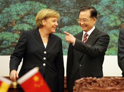 China, Germany ink 19 agreements as Merkel visits