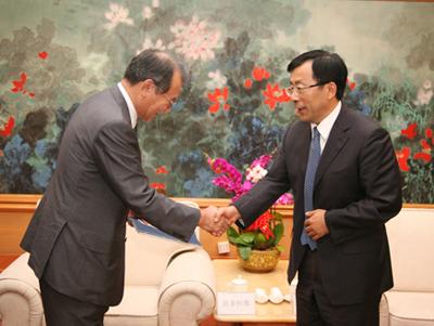 Li Wancai meets President Tsuneo Kita of