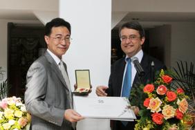 ZHU Min, vice-president, awarded the title of 