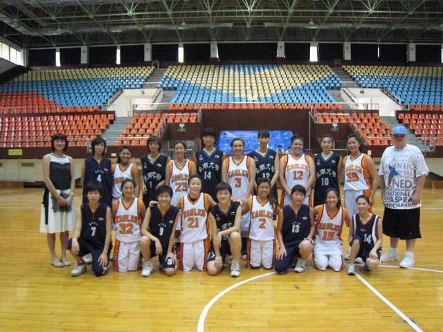 American Basketball Team Contesting with Jinan Universty Team