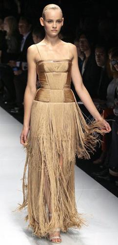 Elegant dress looks dazzle Versace show at Milan Fashion Week