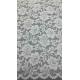 Full Width Stretch Lace Fabric In White, Adorned With Delicate Floral Patterns And Scalloped Edges Luxuriously