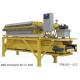 Integrated filter press with conveyor for solid-liquid separation of various suspensions