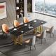 Sophisticated Marble Dining Table With Shiny Stainless Steel Base
