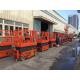 Safety Load 320KG Hydraulic Scissor Lift With Working Height 13.8m Orange Color
