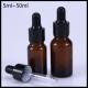 Durable Amber Essential Oil Glass Bottles Black Aluminum Screw Cap Round Shape