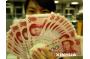 China pledges further RMB exchange rate regime reform