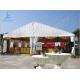 White Roof Cover outside event tents for Golf Villas Sales Conference with