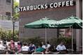 Starbucks buys back control of stores