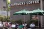 Starbucks buys back control of stores