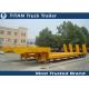 Customized dimension 80 tons heavy duty semi Low Bed Trailer truck 12 KW Diesel