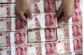 China's new loans shrink in May, growth of money supply slows