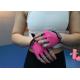 Pink lightweight half-finger workout gloves offer comfort and grip during weightlifting sessions.