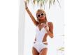 Paris Hilton swimsuit photo shoot in Malibu