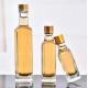 Glass Olive Oil Bottle 100ml 250ml 500ml Round Clear Cooking Oil Bottle with Cap
