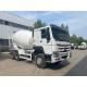 Manual Transmission 6-10 Cbm Sinotruk HOWO Mixer Truck with Double Reduction Drive Axle
