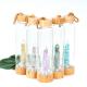 Round Glass Water Bottle With Natural Crystal Gemstone Center Elixir Crystal Point
