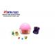 Tasty confectionery cupcake jelly bean candy with small toys