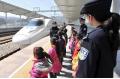 Children from mountainous areas welcome bullet train