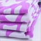 Rusha Textile   Purple Ground White Dots Printed Poly-Spandex Single Jersey Fabric
