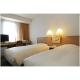 Lae standard twin room hotel furniture of wood headboard bed with long combine desk table and fabric chairs
