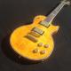 Standard LP electric guitar with gold hardware and flower inlay