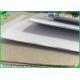 Recycled Pulp C1S Coated Duplex Board Grey Back 23 * 36 For Clothing Tag