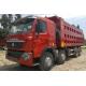 CNHTChowo DUMP TRUCK Manual Transmission Type and Diesel Fuel Type 8X4 red color