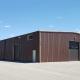 Low cost China Factory Customized Prefabricated Metal Building Kits Workshop Welding Steel Structures Warehouse Building