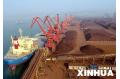 China's steel enterprises pay more for iron ore