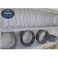 Sharp Flat Wrap Razor Wire Coil In Railway Protective Anti Climbing