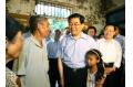 President Hu visits flood-battered southwest city