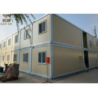 Yellow And White Storage Container Houses Two Layers With Internal Stairs